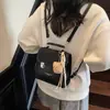 Mochila Estilo Faculdade Feminina 2025 Nova Moda Versátil Bolsa de Mão Bolsa Escolar Viagem Casual Mochila Pequena
