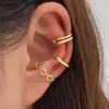 Set de cinco piezas de clip simple y creativo para hueso de la oreja sin perforación transfronterizo, con diseño de hoja dorada calada y aretes de clip en forma de C