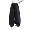 Calça de Moletom Feminina Primavera e Outono 2026 Nova Casual Menina Estilo Coreano Crianças Médias e Grandes Rebite Malha Solta Calça Esportiva Tendência