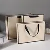 En stock Bolsa de Regalo Naranja Rectangular Bolso Grande Tienda de Ropa Bolsa de Papel para Compras Bolsa para Regalo de Cuidado de la Piel