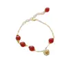2026 Nuevo Modelo Ins Xiaohongshu Diseño de Nicho Pulsera de Amistad con Colgante de Campana Dorada Estilo Chino para Mujeres