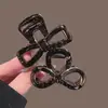 Pinza para el pelo acrílica hueca de diseño único para mujer, nuevo clip de tiburón popular otoño 2026, pinza de garra de peinado de alta gama