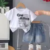 Conjunto Masculino 2026 Verão Novo Estilo Infantil Casual Manga Curta Roupa de Verão Estampa de Letra Estilo Coreano Conjunto de Duas Peças Tendência Atacado
