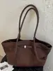 Bolsa Saco Versátil Simples de Luxo Feminina 2026 Outono Inicial Nova Tendência Estilo Coreano Exquisite Elegante Bolsinha de Mão Ombro