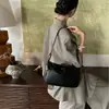 Bolso de hombro único nuevo y elegante, bolso de mano de nicho para mujer, sensación de alta gama, gran capacidad, cierre exquisito, bolso cuadrado pequeño cruzado