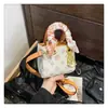 Comércio exterior textura de luxo leve Mini tamanho pequeno bolsa quadrada pequena bolsa mensageiro com estampa retrô bolsa de ombro versátil para mulheres atacado