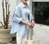 Camisa casual de manga larga estilo coreano con cuello camisero para mujer, nuevo modelo otoño 2026, corte holgado, estiliza la figura y es elegante