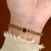 Simple Jilihe Nuevo Cordón de Mano con Cuentas Chinas Patrón de Piedra Natural Fresca Pura Ojo de Gato de Carretera Cordón de Mano