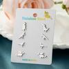 Versión coreana de aretes de dinosaurio pequeños y frescos de acero inoxidable, personalidad Joker, mini aretes, juego de combinación de cuatro pares al por mayor