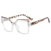 Gafas lisas de ojo de gato irregulares marco de resorte de PC anti luz azul color caramelo marco de gafas ópticas europeo y americano femenino