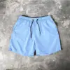 Shorts de secagem rápida logo personalizado cor doce calça de cinco pontos comércio exterior esportivo fino calça de praia shorts de seda gelada de secagem rápida