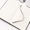 Conjunto de notebook A5 e caneta em estoque, ideal para reuniões e eventos corporativos, um presente prático com opções de personalização de logotipo.