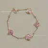 Marca de Luxo High-End Pulseira de Trevo de Quatro Folhas Redondo em Forma de Diamante, Flor de Quatro Pétalas, Flor de Cinco Pétalas para Mulheres, Madrepérola Branca, Madrepérola Rosa, Modelo Popular, Vendas Diretas por Transmissão ao Vivo