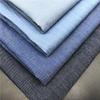 Suministro spot tela de algodón teñida en hilo mezclilla lavada 4.5 oz tela para camisa de jeans primavera y verano