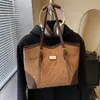 Bolsa Transfronteriza de Gran Capacidad para Mujer 2026 Nuevo Estilo Otoño e Invierno de Gama Alta Versátil Bolso Tote de Hombro para Viajes Diarios Estudiantes Universitarios