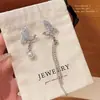 Pendientes Azules de Zirconia Super Hada para Mujer, Elegantes Pendientes de Mariposa con Perlas de Imitación, Diseño de Nicho, Sensación de Alta Gama, Pendientes Adelgazantes