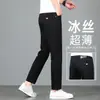 Pantalones Jeans Negros de Seda de Hielo de Gama Alta para Hombre 2026 Verano Delgados Ajustados Pierna Recta Pequeña Elásticos Pantalones de 9 Puntos