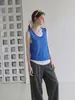 Verão novo nicho único e estiloso design versátil camisola de falso conjunto de duas peças top sem mangas feminino moderno