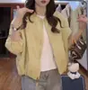 Chaqueta Corta Sencilla de Cuello Redondo Color Sólido Estilo Coreano para Mujer 2026 Primavera Nueva Casual Holgada Versátil Petite Chaqueta de Moda