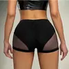Pantalones Deportivos Casuales para Mujer Verano Ins Europeo y Americano Ajustados Pantalones de Melocotón con Empalmes de Malla Pantalones Cortos 5586