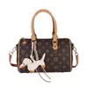 Nueva Bolsa de Almohada de Comercio Exterior Estilo Celebridad de Internet Popular Este Año Bolso de Mano para Viajes Cotidianos Bolso Boston Elegante con Textura para Mujer de un Solo Hombro