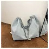 Bolso Tote de Mezclilla y Lona con Correa de Cadena 2026 Nuevo Producto Bolsa de Gran Capacidad para Mujer Estilo Nuevo Nueva Sensación Bolso de Hombro Único