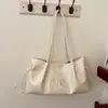 Outono 2026 Nova Bolsa Retrô Feminina Bolsa Tote com Letras Grande Capacidade Ombro Único Manual de Mão Bolsa de Axila Atacado Bolsas Femininas