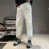 Pantalones casuales cómodos y versátiles de corte tridimensional estilo americano, nuevo modelo de otoño, pantalones casuales simples para hombre con cordón y cintura elástica