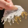 Pendientes de Encaje con Lazo y Corazón de Zirconia Aguja Plateada Lujo Ligero Moda Coreana Estilo de Alta Gama Pendientes de Personalidad de Nicho