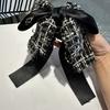 Nuevo Estilo Francés Tela de Cuadros de Alta Calidad Pinza para Cola de Caballo Lazo de Felpa Estilo Chanel Corea del Sur Adorno para la Cabeza Dulce Elegante