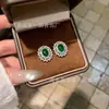 Venta al mayoreo del fabricante: Aretes ovalados de jadeíta natural, con un vibrante tono verde, engastados en plata S925, en un nuevo estilo chino, versátiles para mujer