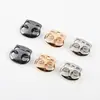 Fabricante de hebillas de metal tipo nariz de cerdo, hebillas de resorte de doble agujero, hebillas de ajuste para ropa al por mayor en stock, hebillas para cordón, hebillas de presión para sombreros
