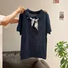 2026 Verano Nuevo Estilo Cuello Polo Estilo Coreano Holgado Top Camiseta Mujer Venta al por Mayor Manga Corta Tejido de Seda de Hielo Estilo Delgado