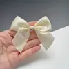 En stock Venta al por mayor Accesorios de moño Cinta de poliéster DIY Hecho a mano Multicolor Diadema de moño Accesorios de cinta para prendas