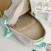 2026 Novas Mochilas Escolares para Ensino Fundamental e Médio Grande Capacidade Estilo Coreano Casual Mochila Casual Mochila de Viagem Esportiva