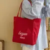 Bolso Tote Rayado de Doble Cara con Tira de Etiqueta Intercambiable para Mujer 2025 Nuevo Estilo Estilo Perezoso Casual Gran Capacidad Bolso de Mano Venta al por Mayor Personalización