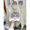 Nueva camisa de estilo chino con cuello mao y cierre de hebilla para mujer Primavera 20224 Nueva camisa casual holgada de moda de manga larga