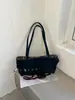 Outono/Inverno 2026 Novo Estilo Coreano Retrô Nicho Cadarço Ombro Único Bolsa de Axila Feminina Versátil Bolsa de Mão para o Dia a Dia Bolsa Tote