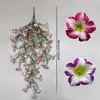 Popular 69 Galhos Eucalipto Artificial Narciso Orquídea Decoração Externa para Casa Trepadeira Pendurada na Parede Flor Artificial Trepadeira Decoração de Natal