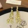 Pendientes Vintage Largos con Borlas de Flor de Rosa Mostrando Rostro Pequeño Exquisitos Pendientes con Sentido Avanzado Pendientes Personalizados de Lujo Ligero Elegantes