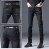 Jeans grises de alta gama para hombre de Hong Kong, pierna recta, corte holgado, pantalones largos casuales vintage de moda, pantalones de hombre de primavera
