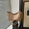 Bolsas de Luxo para Mulheres 2026 Primavera Novo Estilo Bolsa de Ombro para o Dia a Dia Moda Simples Design de Nicho Bolsa de Ombro Único Transversal