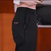 Calça Casual Nova de Primavera e Verão de Alta Qualidade Genuína Seis Bolsos Solta Emagrecedora Elástica para Negócios Esportes ao Ar Livre Calça Longa