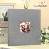 Álbum de fotos Guangzhou Guangmei al por mayor libro de recuerdos de tela 1-10 pulgadas regalos creativos álbum de película autoadhesiva diy