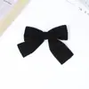 Nuevos y populares accesorios para el cabello de niños, hechos a mano, franela, ángulo plano, lindo, dulce, lazo, color sólido, otoño e invierno, tocado simple