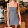 Vestido de tirantes a cuadros de verano estilo vacacional sexy transfronterizo para mujeres petite, elegante vestido corto de línea A entallado a la cintura al por mayor
