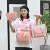Mochila escolar para estudantes de quatro ou cinco peças, mochila feminina para alunos do ensino fundamental, mochila de lona, mochila masculina moderna, rabanete, coelho