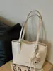Elegante y estiloso bolso nuevo para mujer, tote de gran capacidad, versión coreana 2026, patrón tejido, bolso de hombro casual, moderno