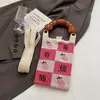 Bolso de Mano de Punto de Nuevo Estilo Color Dopamina Bolso de Almacenamiento Versátil de Nicho Bolso Pequeño de Punto Cruzado