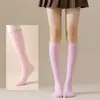 Calcetines de pantorrilla transfronterizos de Europa y Estados Unidos, medias para mujer y calcetines hasta la rodilla, calcetines de rendimiento COSPLAY, danza, calcetines JK de color liso japonés